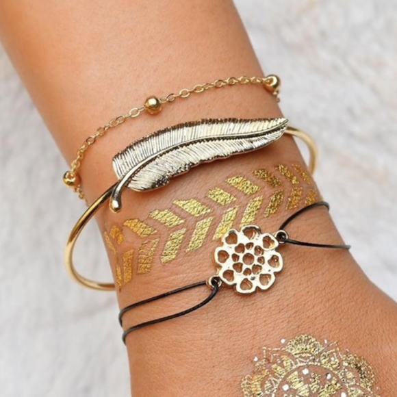 Jewelry - 3-Piece Feather and Flower Gold Toned Bracelet Set